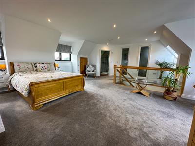 ALTERNATE VIEW OF MASTER BEDROOM